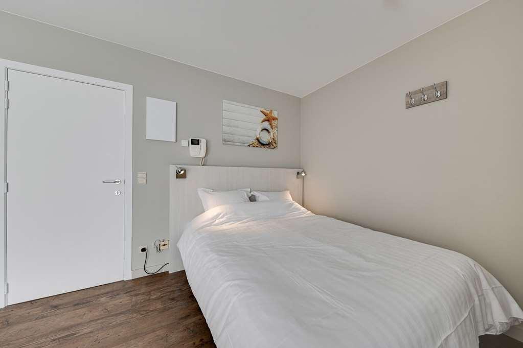 Holiday Suites Le Coq Chambre photo